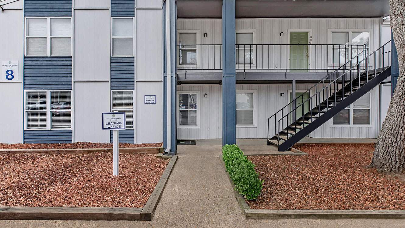 Gallery of Whispering Pines Apartments showcasing comfortable living spaces, community amenities, and scenic surroundings in Nacogdoches, Texas.